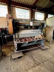 Гильотинные ножницы