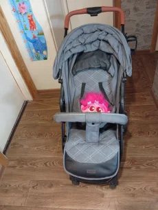 Детскую прогулочную коляску