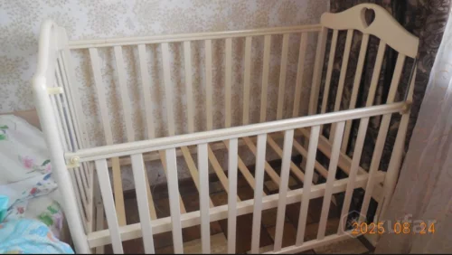 Кроватка с маятником