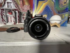 Фотокамеру Sony SLT A58