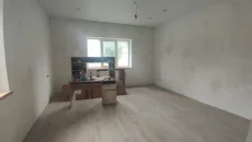 Двухэтажный кирпичный дом