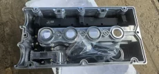 Алюминиевая клапанная крышка на Opel