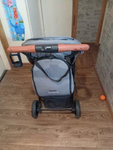 Детскую прогулочную коляску