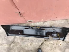 Бампер задний а/мобиля «Ока» с фонарём