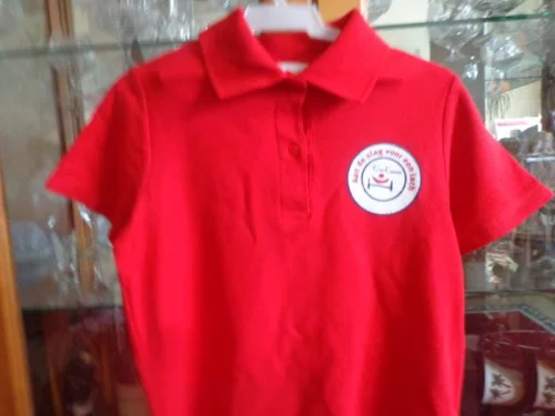 Рубашку-поло для мальчика 6-9 лет