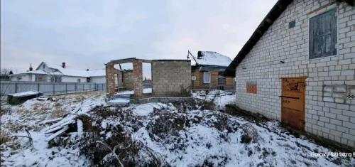 Участок с начатым строительством