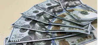 Женщина в Бобруйске принесла в обменник поддельные 100 долларов