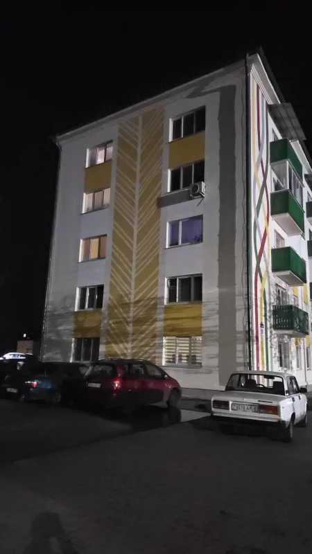 Мурал в виде колоса на торцевом фасаде
