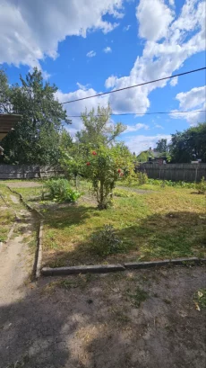Часть благоустроенного дома в городе по ул. Колхозной