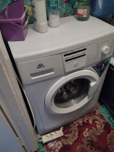 Стиральную машину автомат Атлант