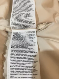 Женский фирменный пуховик