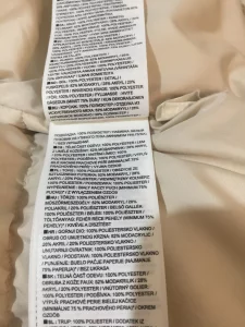 Женский фирменный пуховик