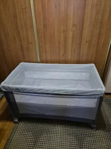 Кроватку-манеж двухярусную продам