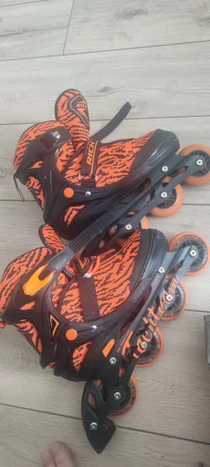 Роликовые коньки