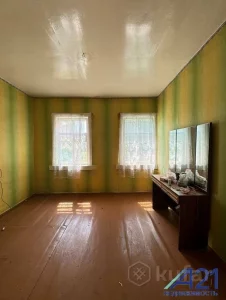 Часть дома с участком и гаражом в переулке Головача