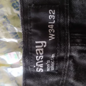 Джинсы мужские