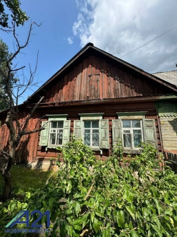 Часть дома с участком и гаражом в переулке Головача