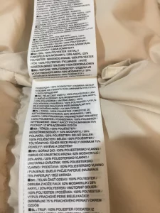 Женский фирменный пуховик