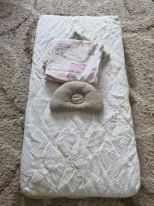 Складную кроватку