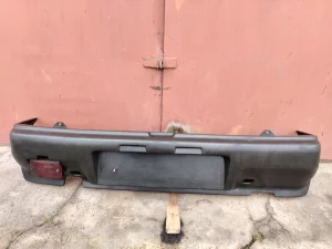 Бампер задний а/мобиля «Ока» с фонарём