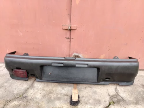 Бампер задний а/мобиля «Ока» с фонарём