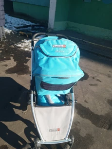 Прогулочную коляскy