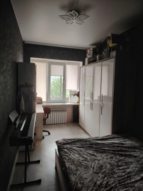 4-х комнатную. квартиру